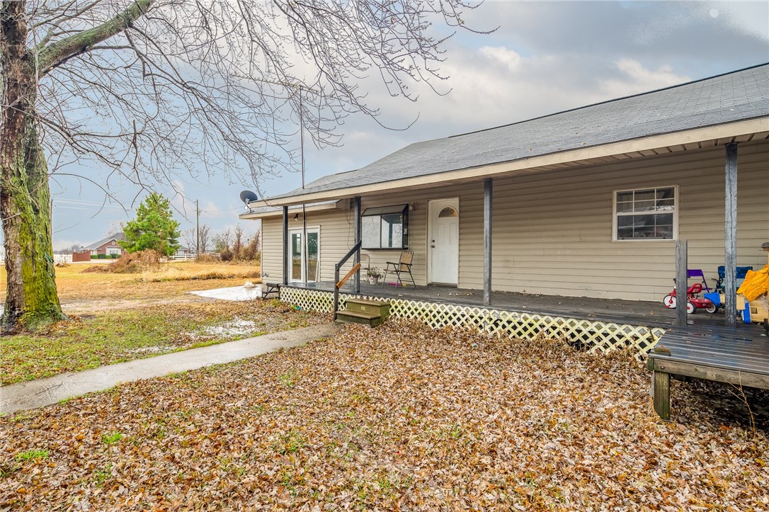 Affordable living on .84 of an acre! Updates include painted cabinets, new doors, new light fixtures and a remodeled bathroom. Large storage/shop. Don't miss this opportunity to own a piece of NWA!