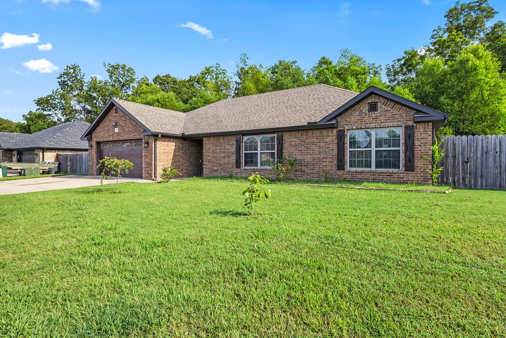 This beautifully crafted 4-bedroom, 2-bath brick ranch offers the perfect balance of thoughtful design and modern ease. The split floor plan provides privacy with the primary suite on one side and three additional bedrooms on the otherāideal for family, guests, or even a home office.
Step inside to find gleaming hardwood floors and a cozy brick gas-log fireplace, perfect for gatherings or quiet evenings in. The neutral palette makes it easy to imagine painting the walls in the colors you loveāa fresh canvas ready for your personal touch.
Outside, your own fully fenced backyard retreat awaitsāperfect for pets, play, or weekend cookouts on the deck.
The neighborhood is quiet and peaceful, offering a sense of calm and privacy, yet the location is unbeatable: just 15 minutes from the U of A and only 10 minutes from Fayettevilleās vibrant dining, shopping, and entertainment scene. Here, youāll enjoy the best of both worldsāpeaceful suburban living with city conveniences close at hand.