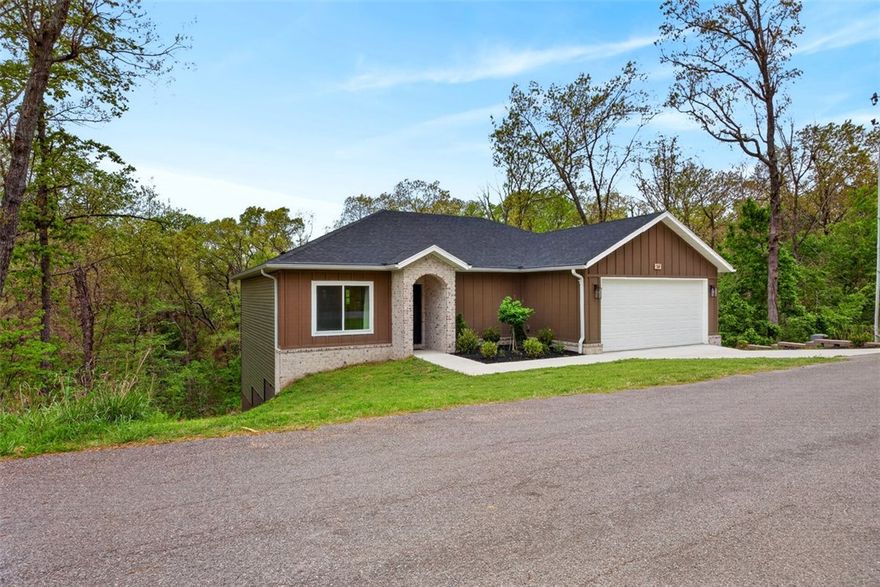 Don't miss this charming home near nature and lake living where comfort meets the outdoors. Nestled with the scenic Bamboozle Trail right behind the property, this home is perfect for those who love an active lifestyle. Just minutes around the corner, you’ll find Lake Avalon offering the perfect setting for relaxing beach days, kayaking, and making the most of Bella Vista’s incredible outdoor scenery. Inside, you’ll discover an open layout with inviting living spaces, ideal for both everyday living and entertaining. This home features a split floor plan, a generous amount of natural light throughout the home and a private back deck with a swing already in place.  Whether you're looking for a peaceful retreat or an active lifestyle, this home offers the best of both worlds. Don't miss your chance to make this move in ready impeccable home your own. 
This is your opportunity to own a slice of paradise, living in a prime location!