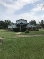 A MUST SEE!!! Home is listed below appraised value. NEW WINDOWS NEW BATHROOM FIXTURES NEW FLOORING NEW DECK NEW PAINT NEW APPLIANCES NEW CABINETS NEW GRANITE COUNTER TOPS NEW LIGHT FIXTURES.Very spacious!! . Home has small shop with electric.