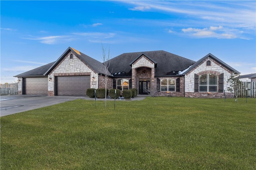 SELLER OFFERING $21,000 IN BUYER INCENTIVES! Step into luxury with this stunning estate, featuring a spacious primary suite with a spa-like ensuite for ultimate relaxation and ample storage. Enjoy the perfect balance of indoor and outdoor living with a covered patio and a tranquil backyard, set on an expansive corner lot. The chef’s kitchen is a true masterpiece, ideal for preparing gourmet meals while entertaining guests in the open-concept living area. The striking stone gas fireplace adds warmth and charm to the heart of the home, making it a welcoming gathering space for the whole family. Additional perks include a 4-car garage and extra parking pad behind the privacy fence. This property offers the luxury, comfort, and space you’ve been dreaming of—your perfect sanctuary awaits!