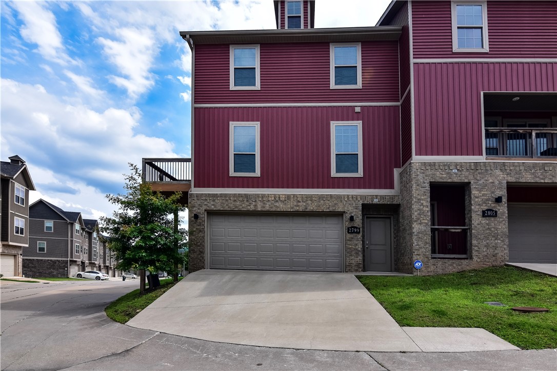 Check out this fully furnished 2-bed, 2.5-bath townhouse near the University of Arkansas! This is a corner unit with private deck. Kitchen features include white shaker cabinets, granite countertops, and stainless steel appliances. Each bedroom has its own full bath with laundry on the same level. Main bathroom has walk in tile shower. No carpet to be found here! All flooring is vinyl wood or tile. This is a prime location near shopping, interstate, and Centennial Park. This is truly turn key. Don't miss out!