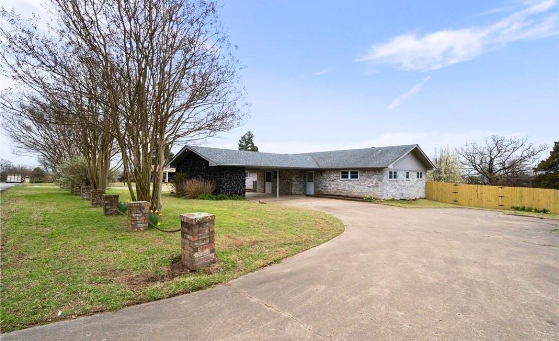 Move-in ready brick ranch on a roomy 0.57-acre lot in Van Buren! This 3-bed, 2-bath charmer pairs open-concept living with a stylish granite-topped kitchen, stainless appliances, and easy-care laminate & tile floors. Step out back to your own resort: an in-ground pool, expansive covered deck, and fully fenced yard—perfect for summer gatherings. A 2-car attached carport plus circle drive keep parking effortless. Bonus: seller financing is available—ask for details!
