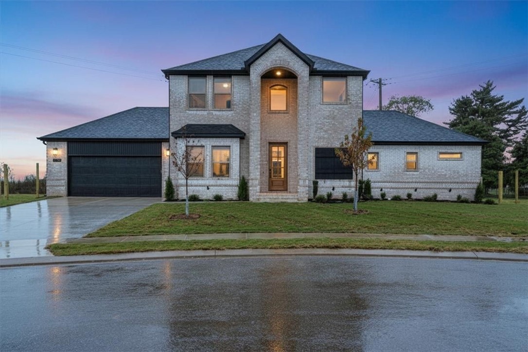 Builder is offering up to $10,000 in closing costs, appliance package, or a 2/1 interest rate buy down with an acceptable offer! Step inside The "Archer Plan" and prepare to be impressed. A grand staircase welcomes you from the entryway, paired with soaring ceilings and natural light that make this home feel bright and spacious. Off the foyer is a versatile formal dining area perfect for hosting or easily used as an office or playroom. The open living room and kitchen feature quartz countertops, black stainless appliances, and a stunning floor to ceiling tiled gas fireplace. The primary suite is a true retreat with a tiled-surround tub, walk in shower, upgraded lighting and mirrors, and a spacious walk in closet. A half bath and laundry room complete the main level. Upstairs offers three bedrooms and a full bath. Enjoy a large covered patio overlooking a .32 acre lot with no immediate backyard neighbors on a quiet culdesac. Enjoy the upcoming community pool in phase 2! Schedule your private showing today!