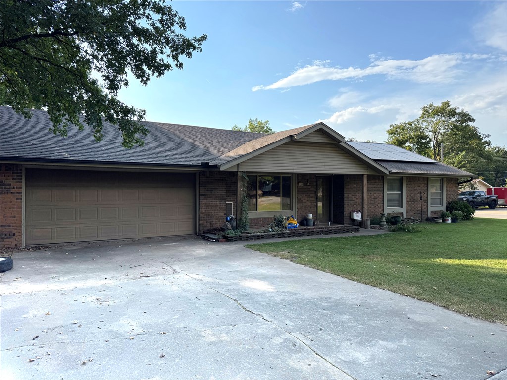 Come make this big corner lot home with big back yard yours! It has plenty of room in the from and back. It also comes with an additional 2 car detached Garage/Shop with street access and it's heated with a gas furnace. New roof 2025, new gutters, HVAC 2018, Solar System is paid off & warranty conveys. Big ticket items have been taken care of! Some updates have been started and it's ready for you to put your final touches on it and finish it your way. The back is fenced in and has 1 storage shed, 1 tiny house/play house, pond, and green house; All conveys! Call for you private appointment before it's gone!