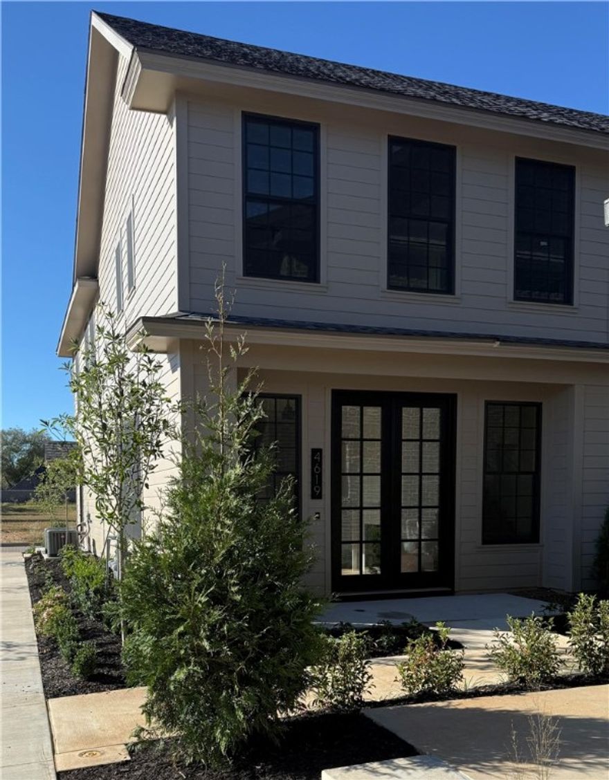 This stunning triplex is located in the heart of town, offering an unbeatable location and unbeatable luxury. The new Pinnacle Village Development is situated right behind the Walmart Neighborhood Market on Pauline Whitaker. Each unit features high-end finishes including hardwood floors, 10' ceilings, 8' interior doors, designer light fixtures and a smart thermostat. The open kitchen features quartz counter tops and high end stainless steel appliances with a gas range. This unit is elevator ready for easy access to all levels. Spacious 2 car garage with an EV outlet. Additionally, the property is within walking distance to Walmart Neighborhood Market, Top Golf, Amp and the best restaurants, shopping, bike trails and so much more! Whether you are looking for a place to call home or an investment property, this triplex offers the best of both worlds.