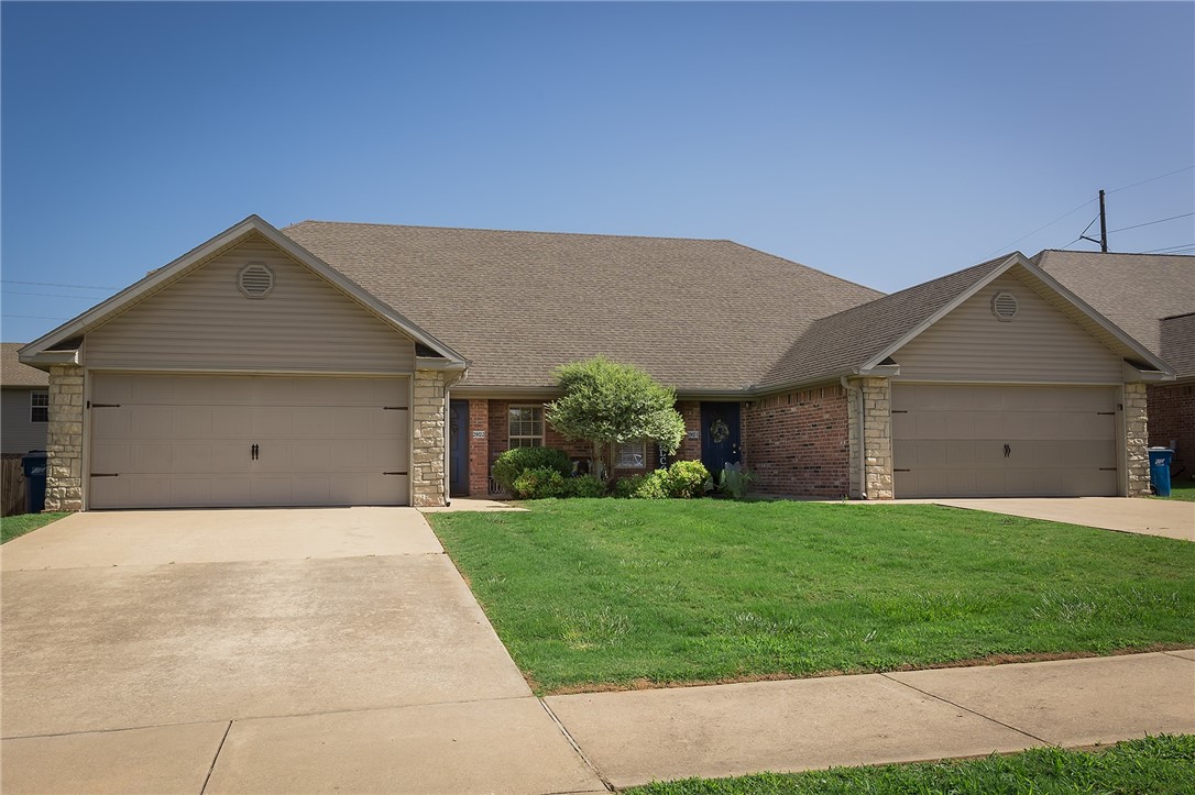 Calling all Investors! This duplex is centrally located in Bentonville, just minutes from Downtown and XNA airport. It features 2 spacious units, each with 3 bedrooms and 2 full bathrooms. The units are identical in layout with an open-concept living room and kitchen, and a primary suite on the main level with an en suite bathroom attached. Each side of the duplex has its own private entrance and back patio to enjoy a morning cup of coffee and each side has it's own large fenced in backyard, perfect for pets or outdoor activities. Don't miss your chance to own this amazing investment property in the heart of Bentonville. Call us to schedule a showing!
