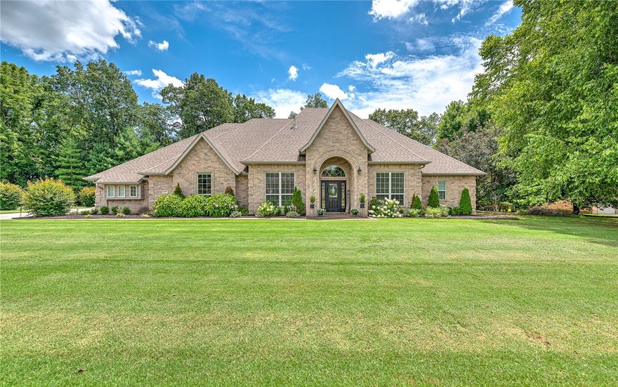 This beautiful all-brick home sits quietly on a peaceful 1.11-acre cul-de-sac lot in Farmington’s desirable Silverthorne Subdivision. The open, split floor plan includes a formal dining area with elegant chair rail molding and a bright kitchen featuring a spacious eat-in nook—perfect for meals or entertaining friends and family. The primary suite is a retreat, complete with a soaking tub, walk-in shower, dual sinks, and a large walk-in closet with built-in cabinetry to keep everything organized. Upstairs, a generous bonus room and full guest bedroom with bath offer plenty of flexible space for family or visitors. Storage is abundant throughout. Outside, the large, private backyard shaded by mature trees and a partially covered patio sets the stage for relaxing afternoons or outdoor gatherings. Conveniently located between the Wedington and Hwy 62 corridors, with easy access to West Fayetteville and Farmington. Just 6 miles from the University of Arkansas and close to parks, it’s a rare find you won’t want to miss!