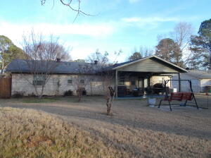 Covered patio in the backyard in 2016, in ground storm shelter in 2014, large workshop with rolling door and walk-through door in 2017. Great updates, large walk-in shower in the master bathroom, living room gas fireplace with stacked stone and granite counter tops in the kitchen. Fenced back yard . Home Generator is included. Central location and comfortable - this will make someone very happy. Call today for your appointment.