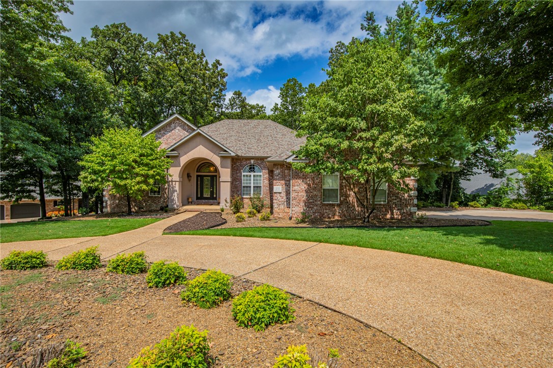 Desirable North Bentonville location in Hanover Subdivision! Conveniently connected to the greenway /trail system and easy access to downtown Bentonville, I-49, shopping, restaurants and more! There's plenty of room for everyone including the Primary suite and two other bedrooms on the main floor, executive office, large gourmet kitchen, 3 living areas, covered deck. The lower level features an additional bedroom, 2nd office (or 5th bedroom if needed), family room, full bath, extra storage and walk-out to the lower level patio. $10,000 allowance for Buyer from Seller with acceptable offer!!