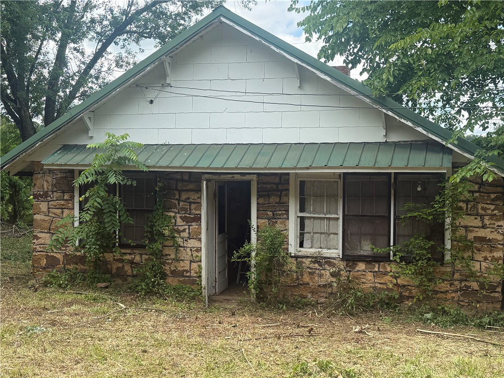1.01 Acres fenced with two outbuildings and main house. Property is difficult to find. 2 bedrooms and 1 bath home that needs TLC and restoration. Diamond in the rough!