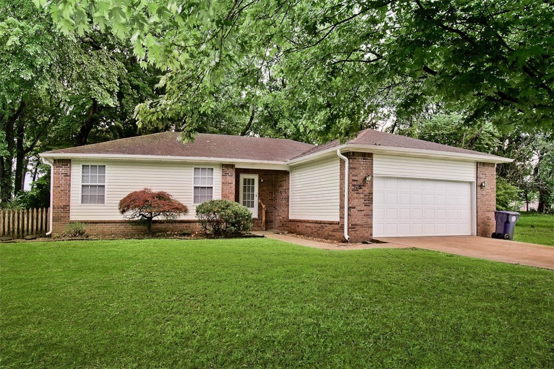 Fantastic home in the heart of Prairie Grove. This 1513 SF home is in excellent condition and is located close to everything in this beautiful town! It has all new interior paint, new carpet and luxury vinyl floors, blinds, 2-car garage, gutters, and a neat picket fence. Plenty of shade trees, too. Right by the schools and convenient to downtown and the water park. Come see!