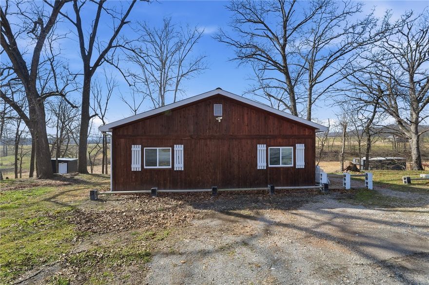 Enjoy country living with this charming home set in a peaceful rural setting with wide-open views. This property offers a comfortable layout and a great balance of indoor and outdoor living. Inside, you’ll find inviting living spaces and practical updates throughout. The kitchen includes ample cabinetry and a functional island that works well for everyday living and entertaining. Natural light flows through the home, creating a bright and welcoming feel. The master suite provides a comfortable retreat within the home, offering space to unwind at the end of the day. Step outside to the back deck and take in the beautiful countryside views — a great spot for morning coffee or relaxing in the evening. If you’re looking for a home that offers space, scenery, and a quiet setting, this one is worth a look. All appliances convey! Outdoor jacuzzi conveys.