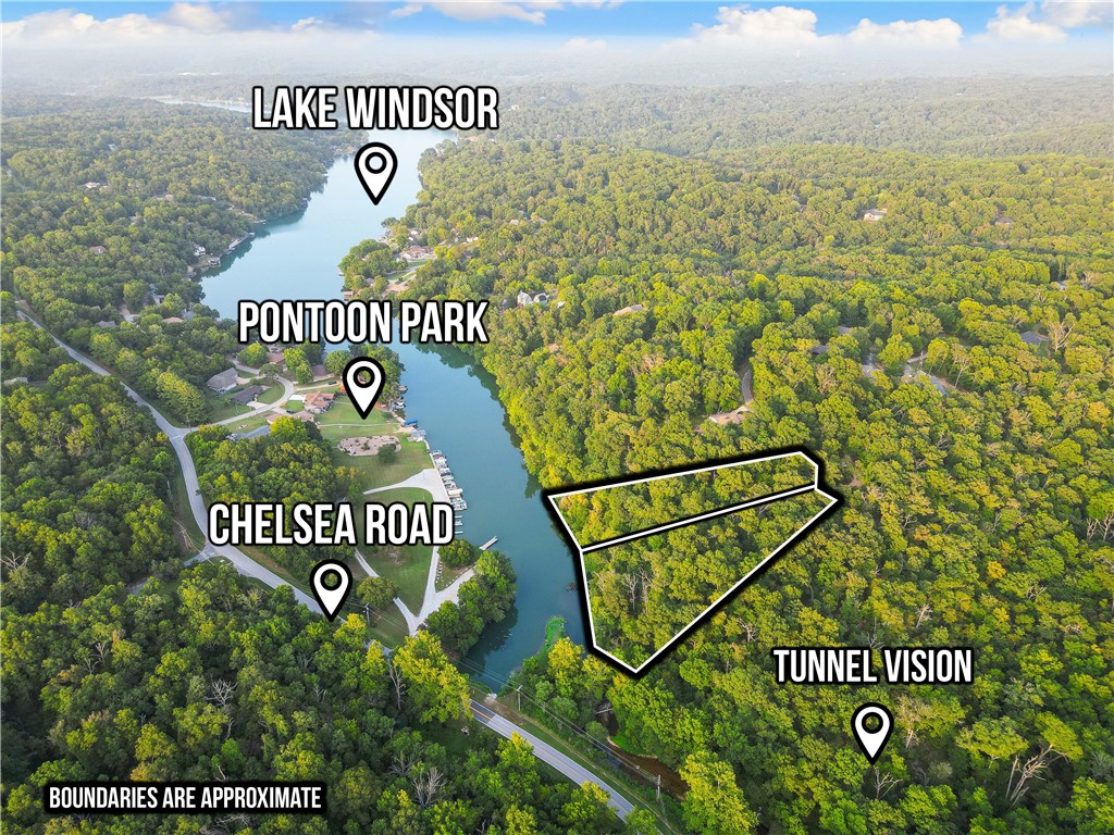 245 feet of Lake Windsor shoreline, 1.91 acres, & only minutes from the New Walmart Campus! Yes, you can have the best of both worlds! Preserve your piece of recreational paradise in beautiful Bella Vista with lakes, streams, golf courses, trails, waterfalls, parks, fitness centers, pools, tennis, pickleball, & more. Nearby trails include Tunnel Vision, Huntley Gravity Zone, & future OZ Trails Bike Park. Price includes both lots. Lake Windsor is one of just three lakes in Bella Vista that allows water skiing, tubing, & wakeboarding. A clear, spring-fed creek feeds into this portion of the lake as well. Lakefront land like this is a rare find. Come take a closer look today!