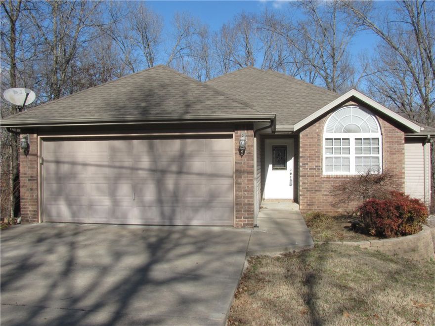 Located in the Metfield area. Close to tennis courts, community pool, and club house and Dogwood golf course. This 5 bedroom 3 bath home is perfect for your family. 3 bed/2bath up stairs, 2 bed, 1 bath with bonus room down stairs. Kitchen is open to living area and dining room, stainless steel appliances, pantry, full privacy fence, faux 2 inch blinds, gutters, fire place in family room. Some repairs are still  being completed.