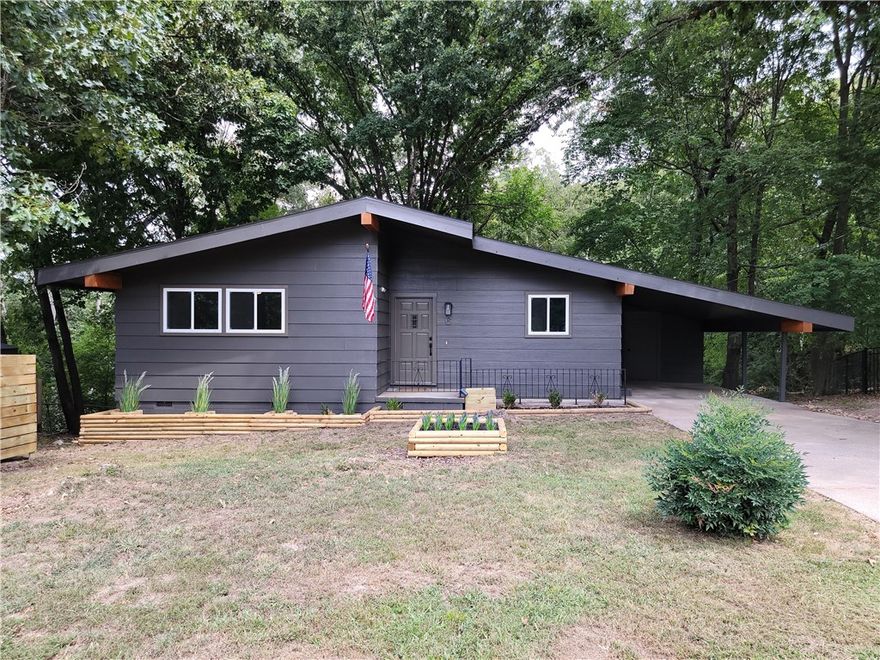 $500 OFF your first month’s rent when you sign by December 31st! Lock in below-market rent now before rates rise in the new year. Ideally located just minutes from the brand-new OZ Trails bike park, this freshly renovated 2-bedroom, 2-bath home in the heart of Bella Vista features new paint, modern appliances, and an updated exterior. A newly added stairway leads to a spacious fenced pet area, complemented by clean, attractive landscaping in front. Inside, enjoy an excellent layout with large bedrooms, an open living area, and an extended sunroom that fills the home with natural light. The primary suite offers a brand-new ensuite bath with a fully tiled walk-in shower. Step out back to a private yard with peaceful wooded views, perfect for relaxing. Conveniently close to bike trails, lakes, parks, and top local amenities. Pets considered with additional deposit/rent upon review.