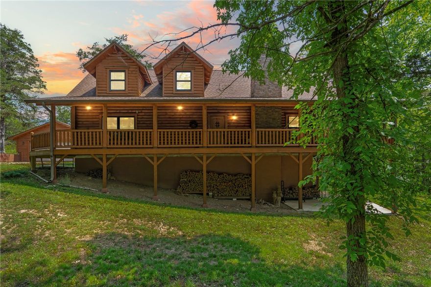 This spectacular, custom built D-Log Home sits on 3.8 acres with a view of the White River and 300’ of frontage. It's a gorgeous retreat cabin that offers cozy comfort, stunning river views, and access to the trout fishing Trophy Zone. Built in 2010, the main part of the house is 2186 SF with an additional 1384 SF walk-out basement ready for completion, with separate HVAC zonal control, private patio, and detached log garage. The house has covered decks on the main floor and below. There is a deep well, charcoal filtration system, and water softener. Amenities include the open structural trusses, granite countertops, zonal heat and air, heat pump, efficient wood burning fireplace, cozy living spaces, alarm system, custom drapes, wood blinds, and more. Whether you are an avid angler or simply looking for a tranquil getaway, this place has it all. Experience the serenity and beauty of this unparalleled White River retreat cabin, just 10 minutes from Eureka Springs and five minutes from lake or river boat launches.
