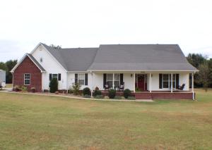 Spacious home in a serene, quiet neighborhood. Enjoy the feel of living out of town while being only a few miles from shopping and schools. Everything you've been searching for is within this 4 BR (or 3 BR + Bonus Room) and 2 full bath home. More features include a shop, above ground pool with a deck, two car garage, and all of the storage space you've been dreaming of. Positioned on 1.46 acres, you'll enjoy the neighborhood feel while having plenty of space of your own. Take a look before it's gone.One Year Home Warranty Included