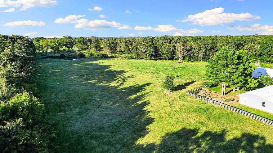 5 private acres in one of the most idyllic spots in Arkansa overlooking Prairie Grove! This is a must-see dream view, located up on a gentle hill. There's space to build a private driveway from Prairie View Rd, or you can also access the property from Timberpath Rd via private gate. The western edge of the property is lined with mature trees. The east side of the property looks out onto pasture and woods. There are several great spots to build your dream home where you can enjoy the view and privacy as well! Photos don't convey the view, must come see!