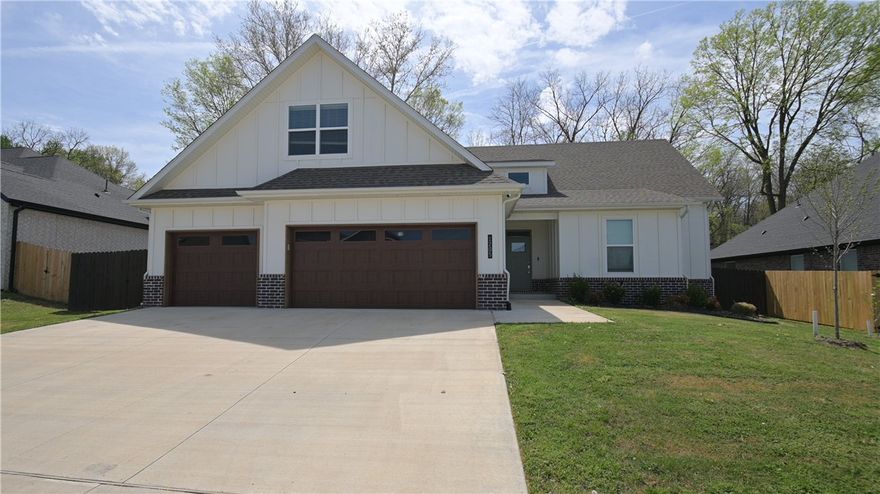 Live where every day feels like a retreat at The Greens at Sugar Creek—just steps from Big Sugar Golf Course. This thoughtfully designed two-story home offers 4 bedrooms on the main level, with a private upstairs bonus room and powder bath—perfect for guests, game nights, or a quiet escape. The open-concept living, dining, and kitchen create an effortless flow for entertaining, while upscale finishes like quartz countertops, custom cabinetry, a pot filler, and a statement vent hood elevate everyday living. Enjoy modern comforts with energy-efficient appliances, LED lighting, and smart home features—all in a location that keeps you close to the best of Northwest Arkansas. Don't wait, schedule your private tour today!