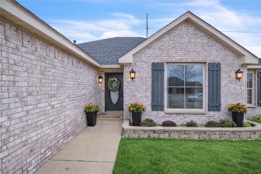 Welcome to 6003 S. 36th Street in Rogers — a beautifully updated 3-bedroom, 2-bath home offering 1,718 square feet of comfortable, modern living in a prime location.

This brick  home was thoughtfully updated in 2020 with a new roof, new HVAC system, new flooring, and a stunning kitchen remodel featuring quartz countertops and updated finishes. The kitchen is fully equipped with a dishwasher, electric range with self-cleaning oven, microwave, refrigerator, garbage disposal, and pantry — perfect for both everyday living and entertaining.

Enjoy cathedral ceilings, ceiling fans, walk-in closet, built-ins, and included blinds and select drapes throughout the home. Some listing photos have been virtually staged to help showcase the home’s full potential.
Step outside to a covered back porch, a cozy fire pit area, and direct backyard access to the Razorback Greenway — ideal for biking, jogging, or scenic walks right from your own yard.
