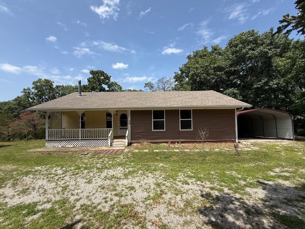 This secluded property offers the sanctuary of a wooded hillside yet close to town amenities. The house sits on a level overlook at the top of the hill with level area for gardening along the stone path walkway. Open floor plan, both bedrooms have private access to bathrooms. Ideal weekender, investment, or make this home your forever retreat! Sold AS-IS, no repairs. Narrow and steep access to reach the property.