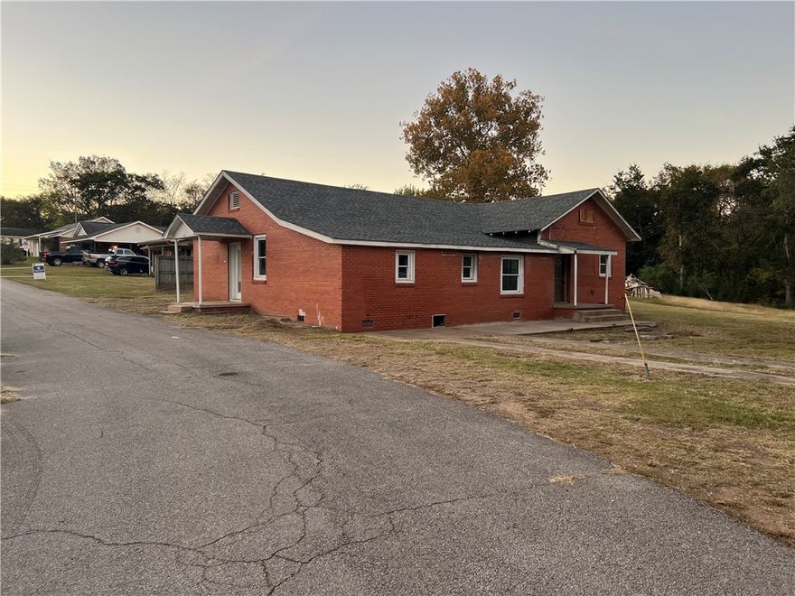Investor opportunity in Ozark! Solid brick structure built around 1965 on a 0.52-acre lot in the heart of Ozark, Franklin County. The home needs full renovation — no finished walls or electrical system — making it ideal for an investor or builder. Spacious lot with duplex potential (verify with city zoning). Located on Carver Street just minutes from downtown Ozark, schools, and local shopping. Easy access to I-40 and the Arkansas River Valley. This property is being sold as-is — cash or investor financing only.