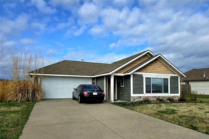 **LIVE AUCTION** Auction will be held at the house on Thursday, April 9th at 10:00AM. Beautiful Craftsman-style 3BR, 2BA home with 1,233 sq ft and a 2-car garage in the heart of Prairie Grove! This inviting property features a spacious living area with a cozy gas log fireplace and a comfortable dining space, perfect for everyday living or entertaining. The home offers a landscaped yard and a peaceful setting in a quiet neighborhood. Some appliances convey, making this home move-in ready. Enjoy the nice-sized backyard with plenty of space to relax or play, complete with a privacy fence. Conveniently located within walking distance to Prairie Grove Schools and close to emergency services, shopping, parks, the library, and more. Experience small-town country living just 13 miles from the University of Arkansas. It’s recommended the property be viewed &/or inspected prior to the auction. Reserve auction. Seller has every intention of selling on the day of the auction. Sold As-Is. See Website for Terms & Conditions.