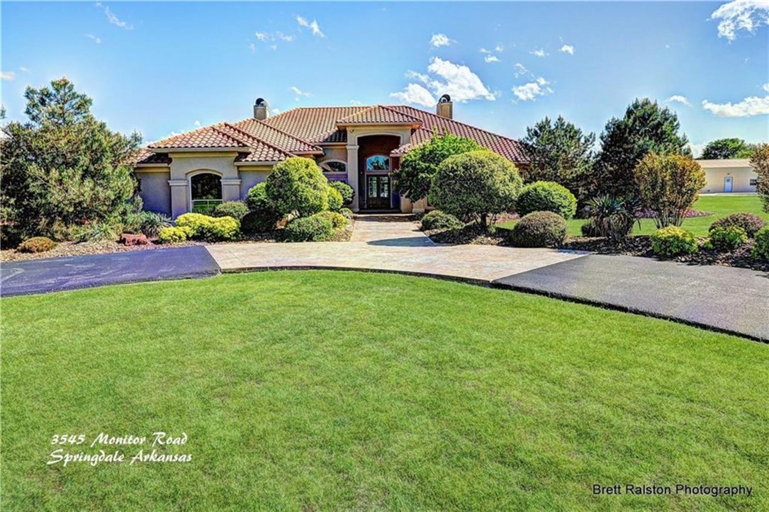 Centrally located to everything in NWA! This is the dream house you have been waiting on to make your next home! You can sit outside by your pool and enjoy the view of the gorgeous sunrises, sunsets and rainbows against the backdrop of hills and open fields. AWW… This one level European style home has very large rooms, with travertine flooring and detailed crown molding. The master suite is simply amazing! You feel like you are in an exclusive spa. The closet alone is 14.9’x16’! Every room in the house is very spacious (even the laundry room)! Bring your horses to graze on your 7 acres and there is a huge detached shop that is a must see. The kitchen would please any chef! Too many amenities to list. Please don’t miss this opportunity to make this one of a kind property your next home!