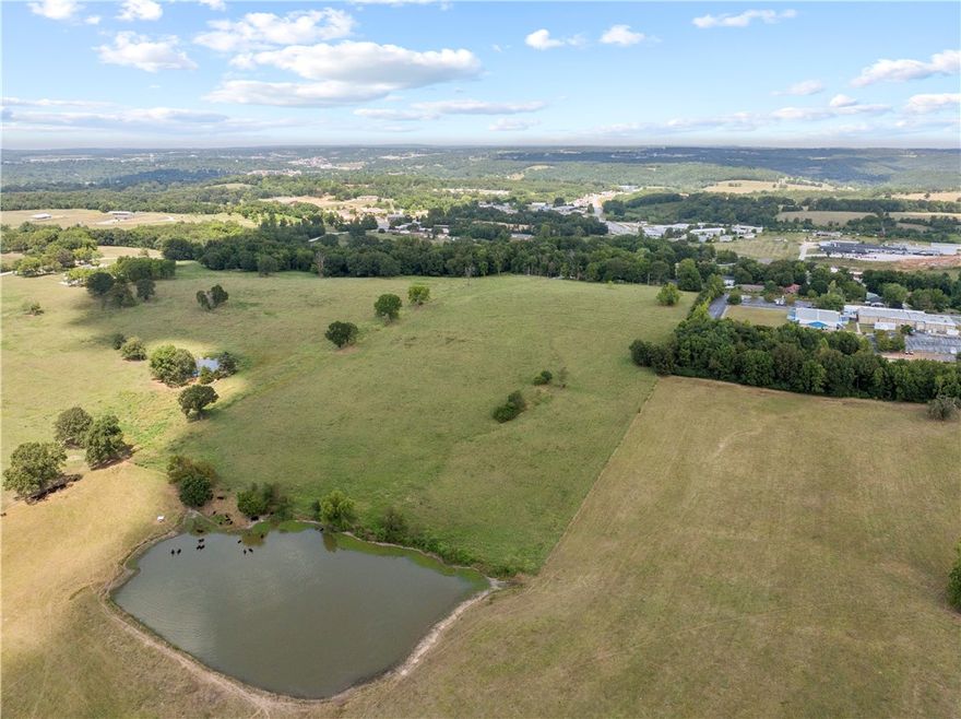 Prime development opportunity in Harrison, AR! This 18-acre tract is your chance to develop in one of Harrison’s most accessible and visible locations. Zoned R3, this property also includes architectural plans and blueprints already completed for a 30-unit apartment complex—a significant value that saves both time and cost in the planning phase! Location is a key advantage. Just 0.25 miles off US 62/65, the site provides immediate access to one of the region’s busiest highways, while sitting less than a mile from North Arkansas College. Making it an ideal fit for student housing, workforce housing, or other rental-focused projects to meet strong local demand. Currently open pasture, the land is straightforward to build on and offers flexibility for developers and investors. Whether you proceed with the existing apartment plans, explore senior living, or pursue other commercial or multifamily options, this property delivers the visibility, zoning, and market demand to support a successful project.