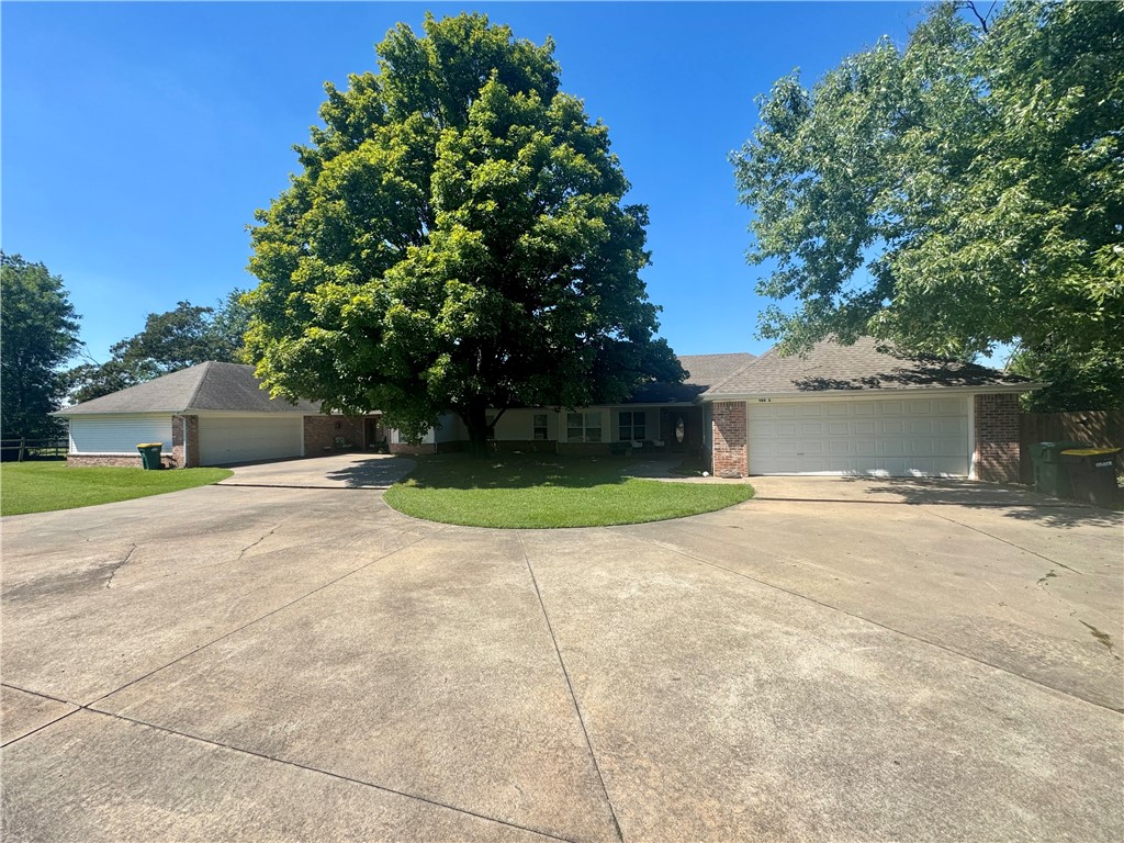 100% occupied, Income Producing House and huge duplex in great Rogers location close to Aquatic center and convenient to Pinnacle area. 4,766 SF Duplex and 1,641 SF house on 1.18 acre. Priced well below replacement cost. High demand rentals with excellent rental history. Opportunity to increase rents. Each side of the duplex is 4 Bed 2 1/2 Bath on 1 level. Oversized 2 car garages. Vaulted ceilings, walk in closets. Large level yard with privacy fence. Tenants pay all utilities. House is 3 Bed 2 Bath. One level. Four car garage. Tenant pays all utilities. Agent owned.