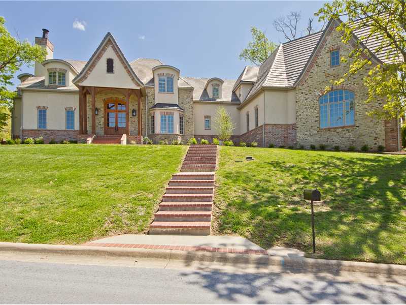 Towers above the tennis club with a fantastic view of the courts and pool. State of the art kitchen, Dacor 5 burner gas range, wine fridge and warming drawer, overlooks the hearth room with wet bar. 3 woodburning fireplaces. Media room with a workout/,bonus room attached, office with fireplace. Paned floor to ceiling windows in Living room. 4 car garage. ALSO available for Lease at $4,500.00 p/month. ML#684749