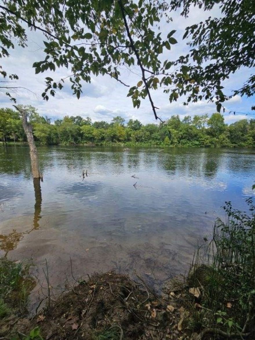 Riverfront with a walking trail to the White Rivers edge!!! This beautiful land is very secluded and private as the road dead ends shortly past the property. The sellers have installed a well, septic for a 2-bedroom home and electricity for your future build. Part wooded and part cleared this land is perfect for your dream home, fishing cabin, RV site, camp site or just about anything else you desire! The 2021 Shadow Cruiser Travel Trailer currently on site is available for purchase outside of escrow so you can start enjoying your land immediately! Hurry, riverfront land is scarce and highly sought-after.