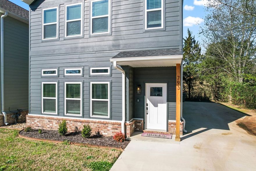 Tucked into a prime pocket of South Fayetteville, this beautiful modern home welcomes you with ease and intention from the moment you step inside. The main level features abundant natural light and an inviting living space anchored by a gas fireplace, flowing seamlessly into the kitchen with custom cabinetry that is perfect for everyday living and entertaining. Plus no carpet—just seamless hardwood flooring throughout for a clean, elevated feel.
Upstairs, all three bedrooms offer a quiet retreat, including a spacious primary suite with a soaking tub, walk-in shower, and generous closet. Convenient upstairs laundry adds function right where you need it.
Enjoy the neighborhood green space and a POA that takes care of lawn maintenance at your new home! 
Don't miss the Tesla charger in the garage that conveys! The location is unbeatable, just minutes from Happy Hollow Elementary, Mt. Sequoyah trails, Stonebridge Meadows Golf Club, and a short drive to the University of Arkansas and Fayetteville High School.