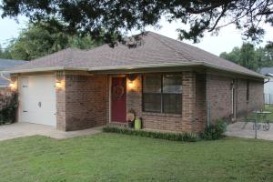 Nice maintenance free 3 bed, 2 full bath brick home with so many features for such a great price including: garage, fenced yard, open floorplan, spacious kitchen, large master with his and hers closets, 4 year old roof, new gutters, and more! All this in a quiet neighborhood. There is a recent survey and the seller will provide a home warranty to make buying this lovely home easy and worry free!