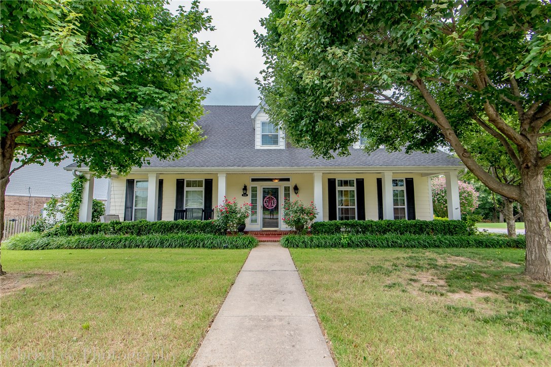 Beautiful one-owner home with lots of charm and room for family. Custom home in Johnson convenient to everything. Large covered porches with manicured lawn and landscaping. 4 bed, 3.5 bath, office space or playroom plus bonus room. Masters on both levels. Walk-in closets and extra storage everywhere. Large fireplace, dual stairways and eat in kitchen. Low maintenance Hardie plank siding. Near community pool, playground and walking trails.