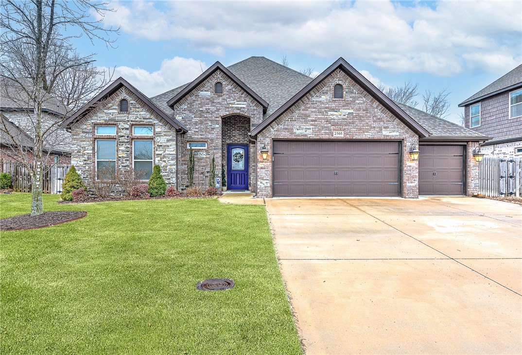 This home has it all and is close to everything Schools,Shopping and Entertainment. The home features a open floor plan in the living area to the kitchen. With 2 Bedrooms and 2 Baths on the main level and 2 Bedrooms and a full bath on the second level. You will love the privacy of the covered patio complete with Gas log fireplace and gas line hook up for a grill. Amenities with the home include, Wood floors,Granite counter tops,Sprinkler system,Instant hot water System,Privacy Fence,Upgraded Appliances that include Huges built in Refrigerator/Freezer. This home is a must see. Grass in First picture is enhanced by computer to show what yard will look like in the summer months