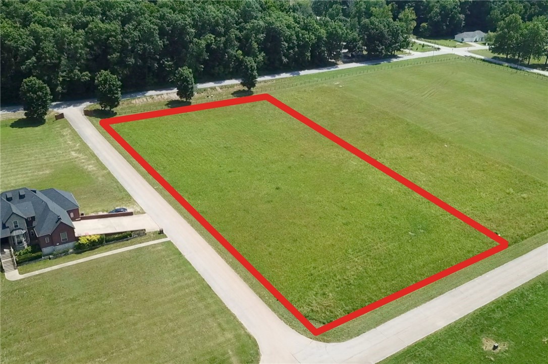 Location, Location, Location – Nestled in the heart of NWA with easy interstate access, you’re minutes from world-class biking trails, museums, Razorback games, and a myriad of shopping & dining options.
Ready to Build – Natural gas, public water, and electric are already on site. Seller will share professionally drafted home & engineering plans, shaving months off your build timeline if desired.
Estate-Style Setting – Surrounded by beautifully kept homes on similarly sized parcels, you’ll enjoy privacy without isolation and a neighborhood that protects long-term value.
Rural Ambiance, City Conveniences – Watch deer at dusk, garden to your heart’s content, or add a workshop or guest cottage, all while being a quick drive from everyday needs.
Whether you’re a visionary homeowner or a savvy investor, this parcel delivers the blank canvas and prime location that rarely come together in Northwest Arkansas. Secure your slice of country-close-to-city living and start building the lifestyle you’ve been waiting for.