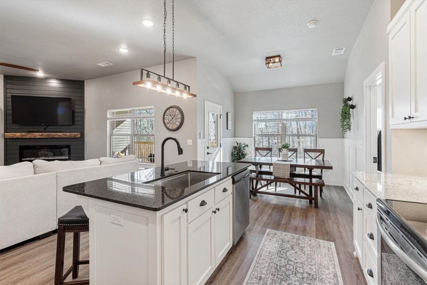 Welcome to 8 Leyland Drive, a stunning blend of modern elegance and cozy comfort in the heart of Bella Vista. This sanctuary offers a thoughtfully designed floor plan featuring 3 spacious bedrooms, 2 bathrooms, plus a dedicated office—perfect for the remote professional or creative soul. As you step inside, the 10-foot ceilings create an airy, expansive feel. Large windows invite a wash of natural light, highlighting the clean lines and high-end finishes that define the space. The primary suite includes a statement wall, private bath with a tiled shower and garden tub. Whether you’re hosting friends in the open-concept living area or enjoying a quiet morning in the sun-drenched kitchen, every corner feels intentional and inviting. Located just minutes from Bella Vista’s world-class trails and lakes, this home isn't just a place to live—it’s an invitation to a better lifestyle. From the moment you enter, you’ll know you’ve found something special. Come in, stay a while, and fall in love.