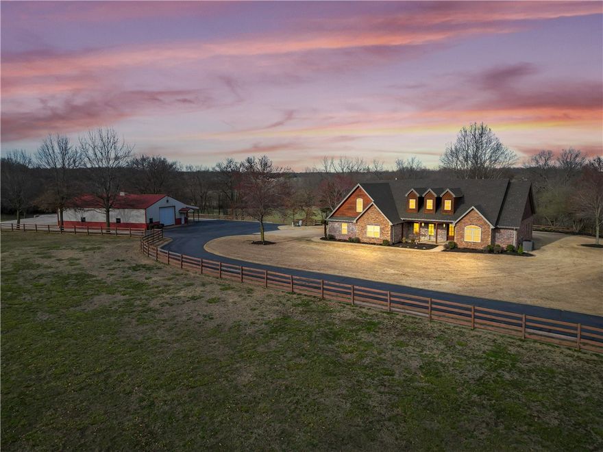 Amazing estate property! Location is convenient to Farmington or Fayetteville! The home sits on a manicured 10 acres mol with multiple outbuildings and overlooks a beautiful valley! This custom built 1 owner home has a great layout for large families or entertaining! The living area is open concept and the bedrooms are huge! Too many amenities to list so come see this for yourself! The setting and location is second to none! Shop building is 40x60 and it includes lean-to stalls and also a separate pole barn. Total Acreage amount 10.11.  Parcel ID# 760-02374-012 (5.40), #760-02397-001(2.66 acres),#760-02374-011 (2.05 acres). The riding arena and shed do not convey.