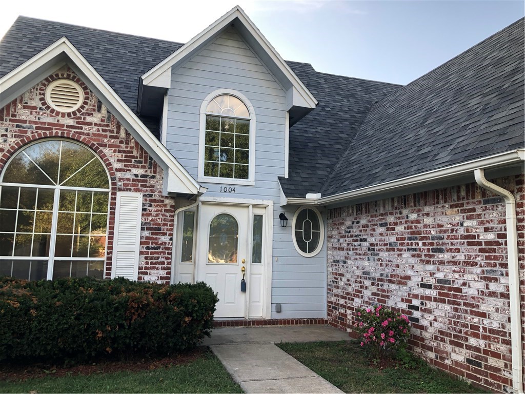 Architectural beauty! 3 bedroom, 2.5 bathrooms, and brand new roof installed by Basey's Roofing. Brand new flooring in kitchen, living room, and master bedroom. Tall ceilings and windows. Home warranty offered with purchase. Nice backyard with deck and storage building. Great location! Close to shopping, restaurants, school, and I49.