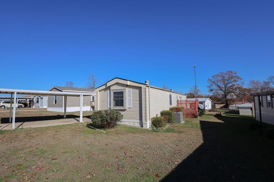 Appraisal for $65k in hand!!!  PRICED $12,100 BELOW APPRAISAL!!!  Back on the market at no fault of seller.  New paint and flooring in this well maintained 16 x 70 mobile home in Rolling Meadows Park(55+). The home has a split and open floor plan with a beautiful large kitchen and lots of cabinet space! There is a large master suite with large ensuite bath and guest bedroom with second bathroom. The home has a detached carport and TWO STORAGE BUILDINGS!!! This is a beautifully maintained park with a pond. All this and just minutes to shopping, doctors, and all Mountain Home has to offer!  Inspection available with accepted offer!