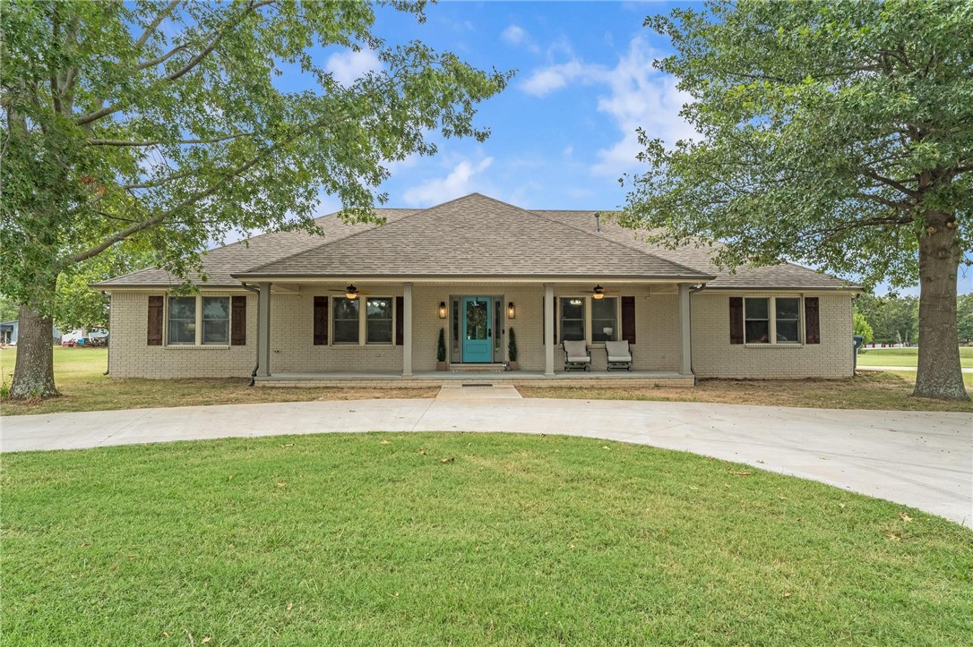 Country feel and city convenience all in one! This 3-bedroom, 2-bath home on 2.58 acres offers a park-like setting with room to ride ATVs. Inside, enjoy an open floor plan with abundant cabinetry and luxury vinyl plank throughoutāno carpet! The layout includes 2 offices and a bonus room, perfect for remote work or hobbies. The primary suite features a cozy gas fireplace, and a spacious laundry room adds convenience. Outdoors, youāll love the covered back porch with an outdoor gas fireplace, an in-ground pool, a fire pit, and a fenced backyard for pets and play. A brand-new roof and a heated and cooled 1,500 sq. ft. shop with a concrete driveway make this property even more functional. All this just minutes from Walmart, I-49, and local entertainment. Homes like this donāt come around oftenāschedule your showing today!