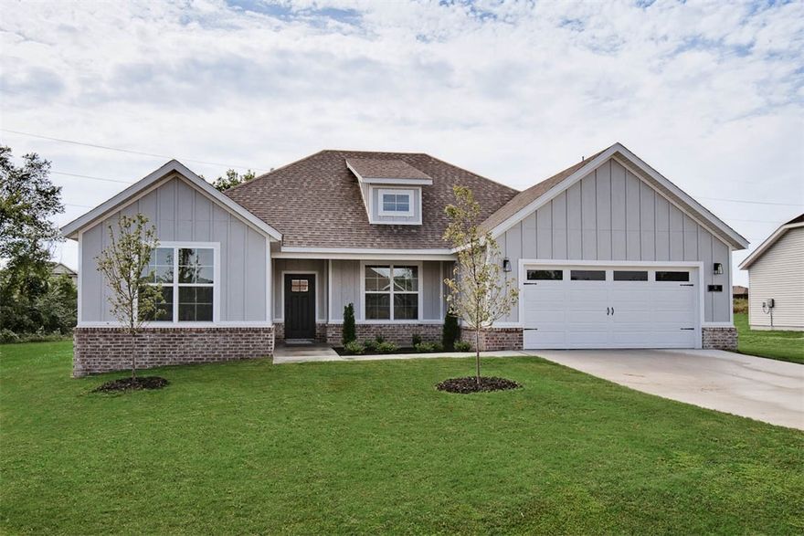 New construction on a .62 acre wooded double lot! Located just down the street from the Lake Loch Lomond boat launch, Highlands Golf Course, and provides easy access to I-49! Step inside to discover a beautifully designed interior with 3BD's + office, a split floor plan, and modern custom finishes throughout. The spacious living area showcases vaulted ceilings with elegant beams, creating an inviting atmosphere. The kitchen features sleek 3 cm quartz countertops, a gas range, custom cabinets, and stainless-steel appliances. Retreat to the luxurious primary bath, which boasts a huge walk-in closet, a large custom walk-in tile shower, and a soaking tub. 2 covered patios. As an added bonus, receive $3,500 towards buyer's closing costs when working with the builder’s preferred local lender!