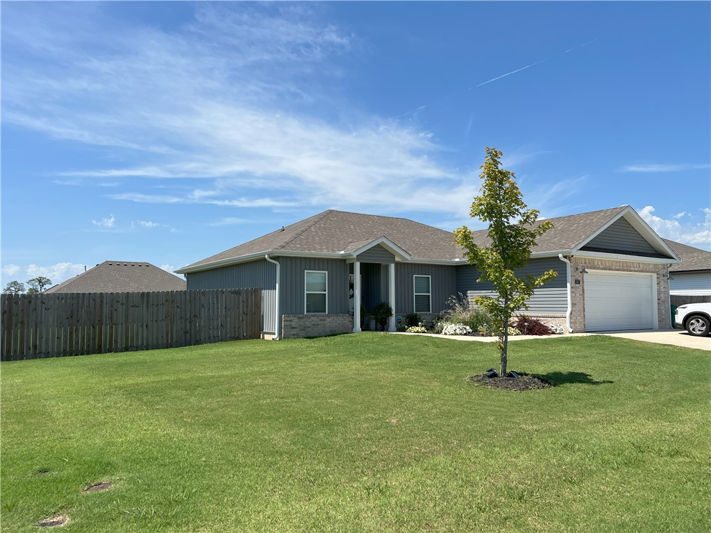Be a part of this brand-new neighborhood in Farmington! Just minutes from Fayetteville, you will not find a better location! Keep the small town feel while you enjoy being part of a community with park and basketball court. Enjoy the open floor plan and walk out to your patio in the back to relax. This home is in a growing school district and just down the street from the city park!