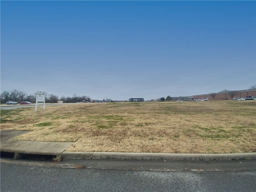 1.55 acre available for $12.50 PSF or Build to Suit Opportunity. Owner may consider sale or joint-venture. Improved lot with C-2 zoning. Covenant controlled with POA. Located on Trail of Two Cities, connecting to Razorback Greenway. Near I-49, Wal-Mart and Sam's Club headquarters and Pinnacle Area of Rogers. Great walkable amenities.