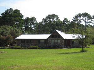 Beautiful lot with a 1760 sq ft home. The home has been update with a new hot water heater and gutters, a large fireplace with a blower for those cold winter nights on the way. Many cosmetic updates and large screened-in back porch.