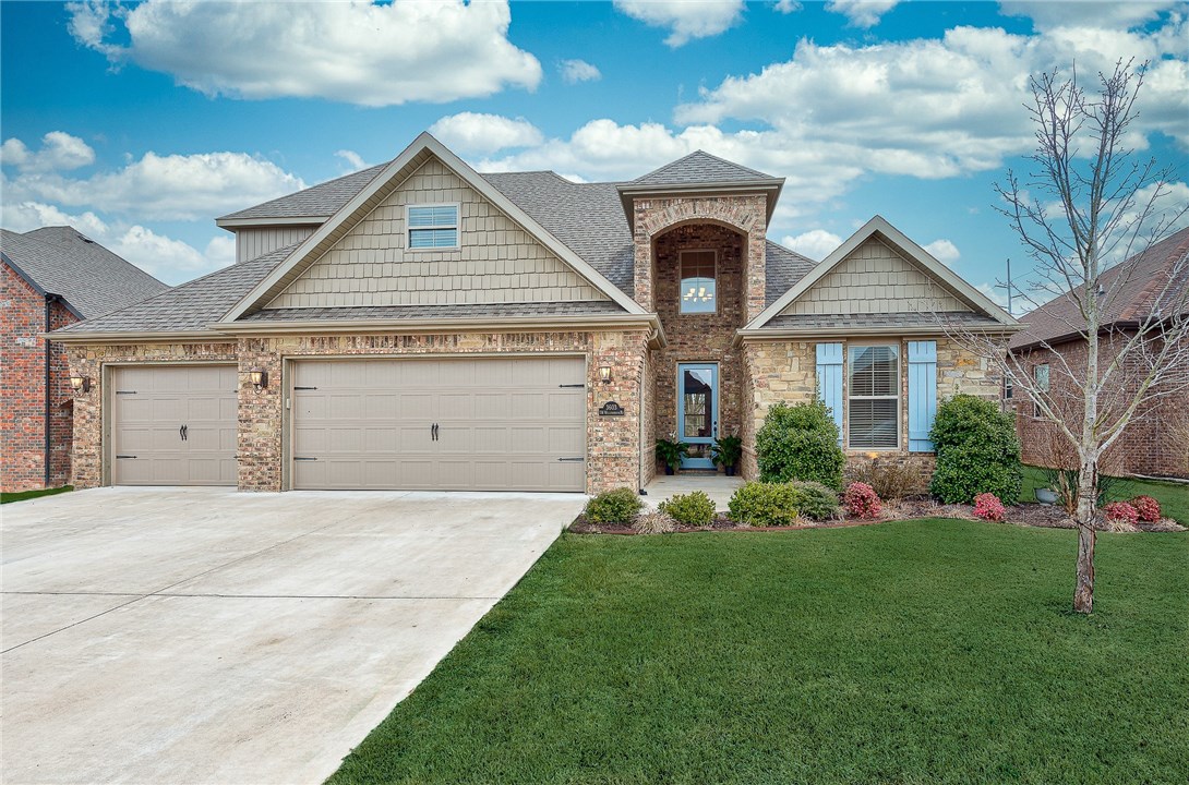 Welcome to this gorgeous Bentonville home with 4 bedrooms, 4 full baths, 3 car garage with workspace, over 3000 sqft and a lush fenced in backyard with shady mature trees. Step inside to a large, bright living area that boasts dark hardwood floors, creamy crown moulding, detailed carpentry and an eye catching fireplace that creates an elaborate first impression. Entertain friends and family in the large eat in kitchen with an extra large dining area and even more seating at the wraparound breakfast bar. An additional downstairs bed and bath can double as an office area or an en suite. Upstairs you will find 2 bedrooms with a Jack and Jill bath and 2 bonus areas including a media room with screen and projector for movie nights. Enjoy all that is Northwest Arkansas with this outstanding location. Within 1 mile to the Bentonville Community Center, parks, trails, top ranked schools, shopping, restaurants and just 5 miles to Downtown Bentonville and the Northwest Arkansas National Airport.