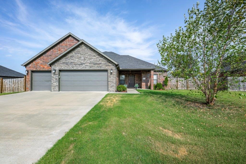 This immaculate one owner home is a showstopper and has been meticulously cared for! Open concept living with the living area featuring lots of natural light, ceramic tile wood look flooring and gas log fireplace. Kitchen hosts custom cabinets, gas cooktop/separate oven, microwave and dedicated walk-in pantry. Spacious primary suite with spa like bath - custom tile shower, corner jetted tub and massive WIC. Enjoy outdoor living on the covered patio overlooking nice flat lawn. Very low maintenance with it being all brick exterior, gutters and more! 100% RD financing available ($0 down payment), ask for details.