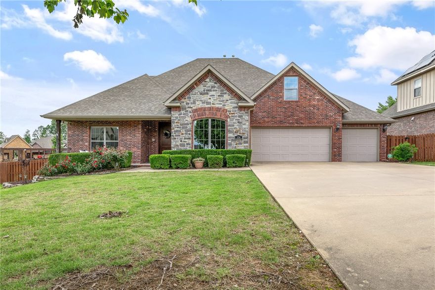 This 4-bed, 4-bath gem in Turnberry at The Peaks offers comfort, space, and a location that’s hard to beat! With 3,528 sq ft, this beauty features a split floor plan, large bonus room, private study, and an open-concept living area with gas fireplace. The chef’s kitchen includes granite countertops, island, walk-in pantry, and gas cooktop.  The spacious primary suite connects to a large walk-in closet, the utility room and has direct access to the private backyard deck.  Thoughtful details like a main floor secondary bedroom, central vac, intercom, and alarm system elevate the home’s appeal. Enjoy Arkansas evenings on the covered patio with outdoor fireplace—perfect for relaxing or entertaining. Corner lot, 3-car garage, and access to the neighborhood pool. All just minutes from I-49, Rogers public and charter schools, Pinnacle Promenade, Walmart AMP, the Greenway trail system, and Walmart’s new Home Office campus. Sophistication, space, and location—it’s all here!